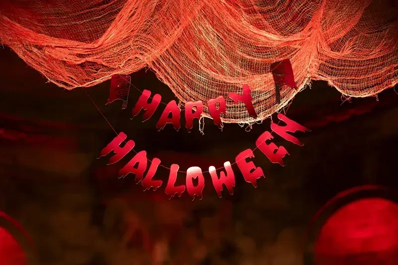 Papírová girlanda Happy Halloween se sekáčky 2 ks